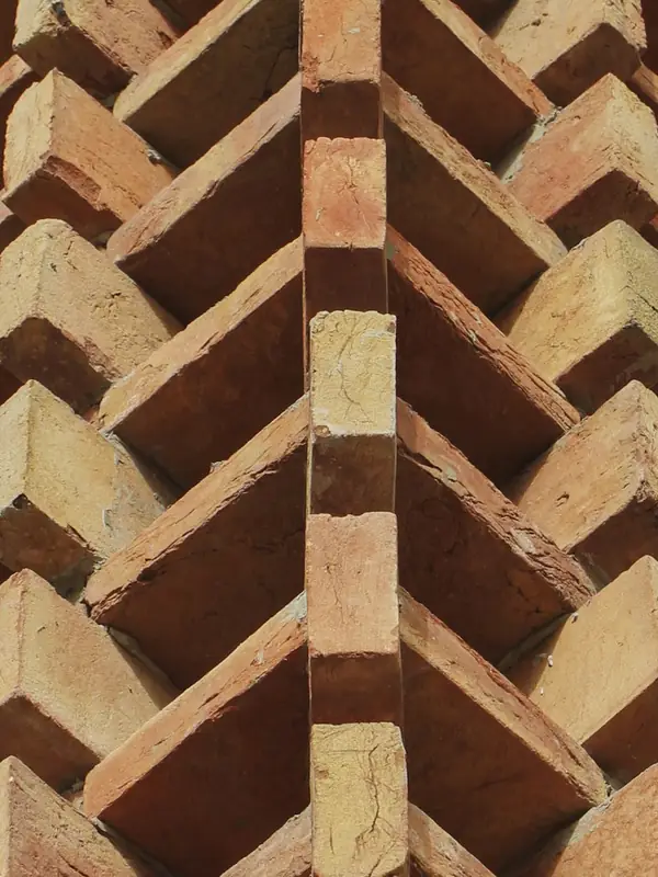 Red bricks laid with open gaps