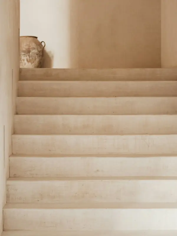 Cream lime-plastered stairs