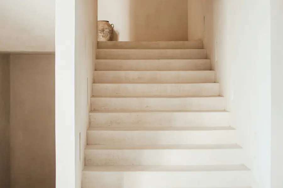 White plastered stairs in soft light