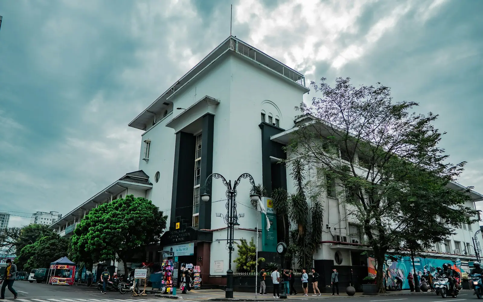 A white art deco building on a corner in Bandung today